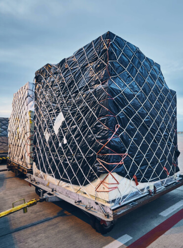 loading cargo to airplane